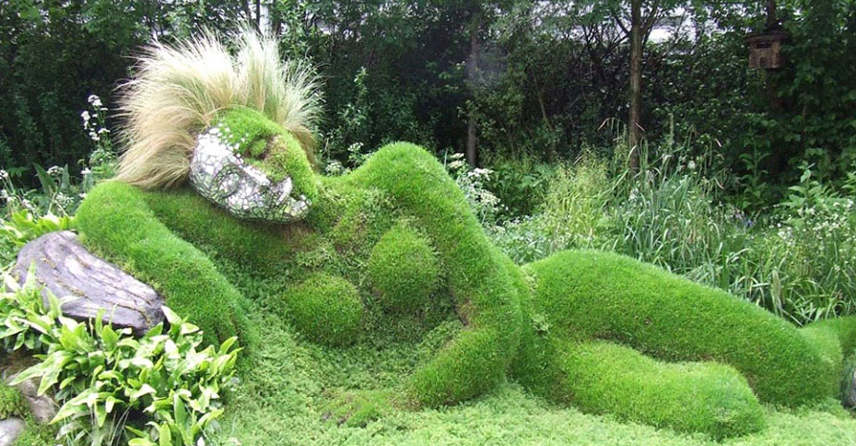 earth mother figure made of grass